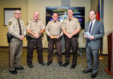 Sheriff Van Shaw (far left), Rick Crayton (middle left), John Crayton (middle), Jason Crayton (middle right) and Judge Marty McGee at the CCSO swearing-in ceremony on December 5, 2022