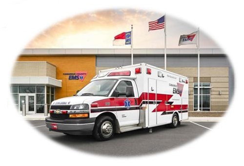 Ambulance in Front of Headquarters Feathered Oval Style